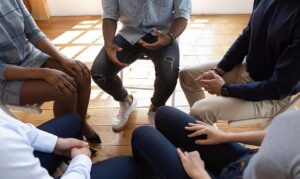 People sitting in a treatment session